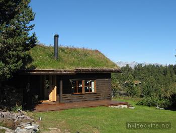 Klikk for stort bilde av 'Hytte med flott beliggenhet og utsikt mot Rondane.'